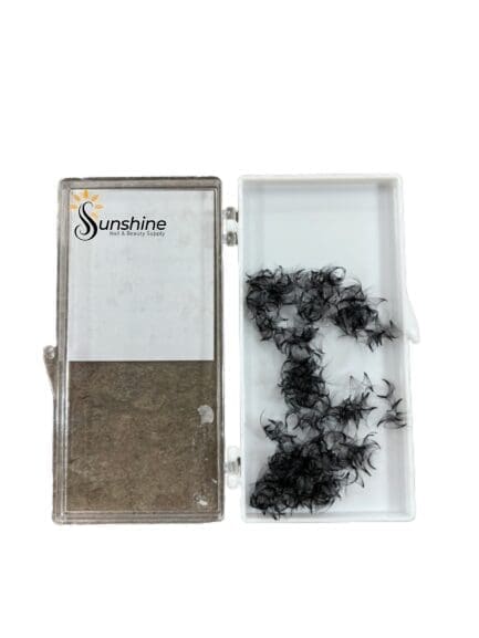 A plastic container holding a box of ROYAL LASHES 7D Pre-Made Fan Individual Lash 0.07 (700pcs).